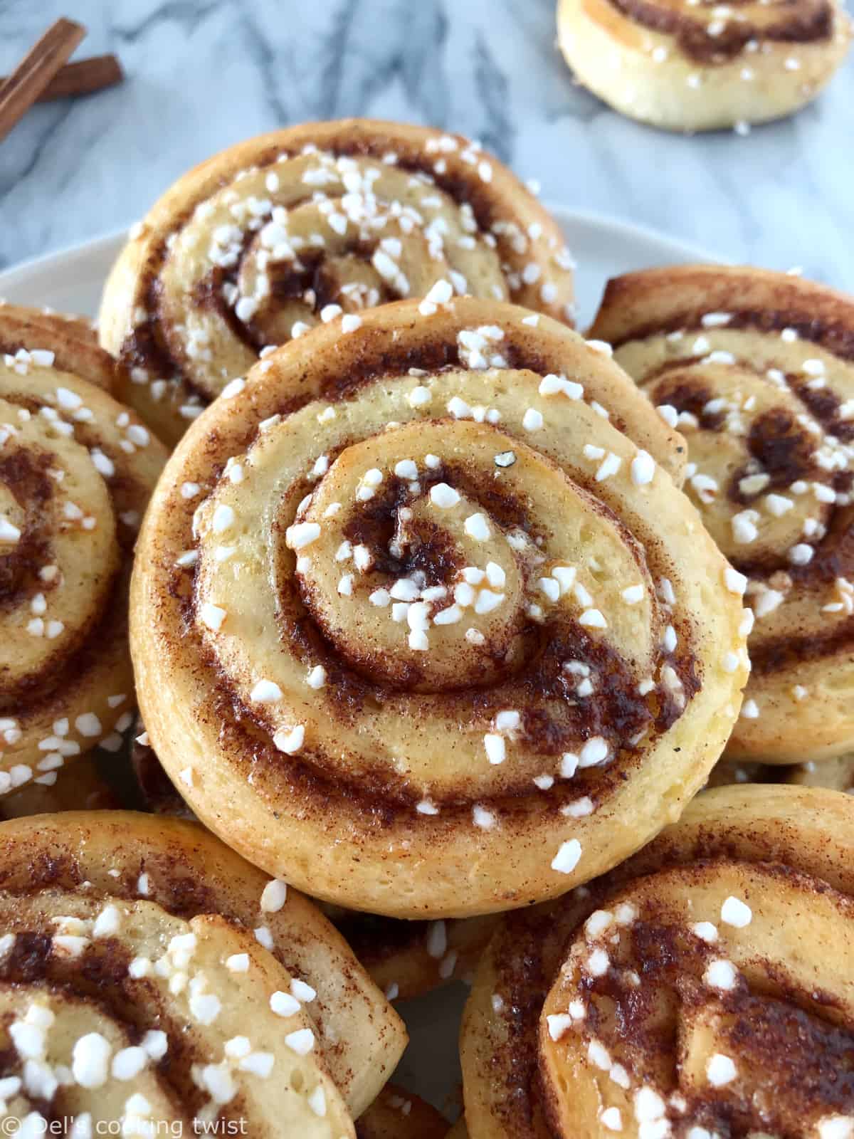 The authentic Swedish cinnamon rolls "kanelbullar". The recipe is extremely easy and comes with a step-by-step tutorial to guide you.