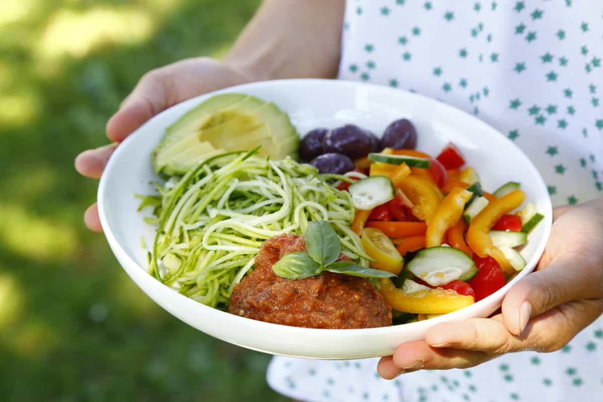 This simple raw zucchini spaghetti bowl makes a healthy everyday lunch recipe, loaded with veggies. It's also vegan and gluten-free.