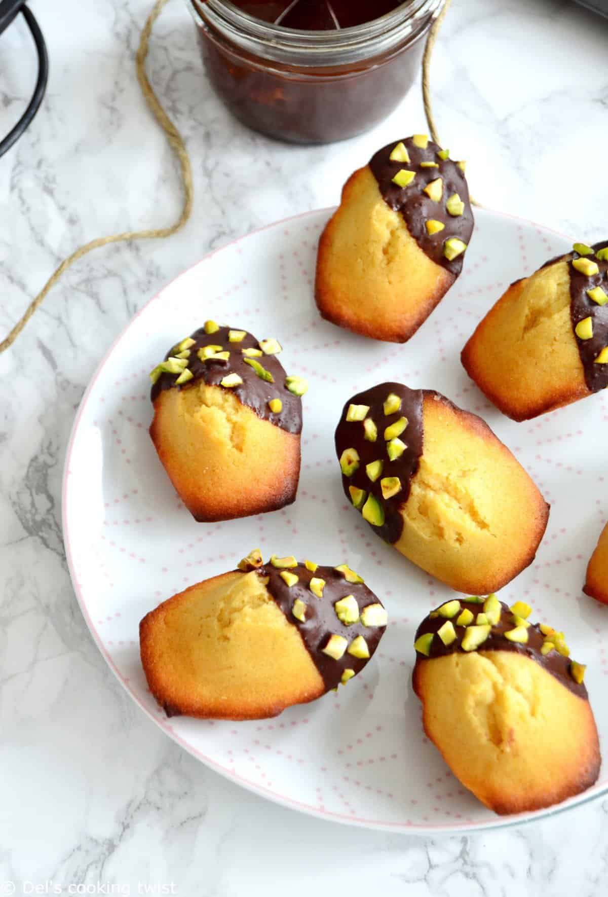 https://www.delscookingtwist.com/wp-content/uploads/2016/11/Dipped-Chocolate-Madeleines-with-Pistachios_0352.jpg