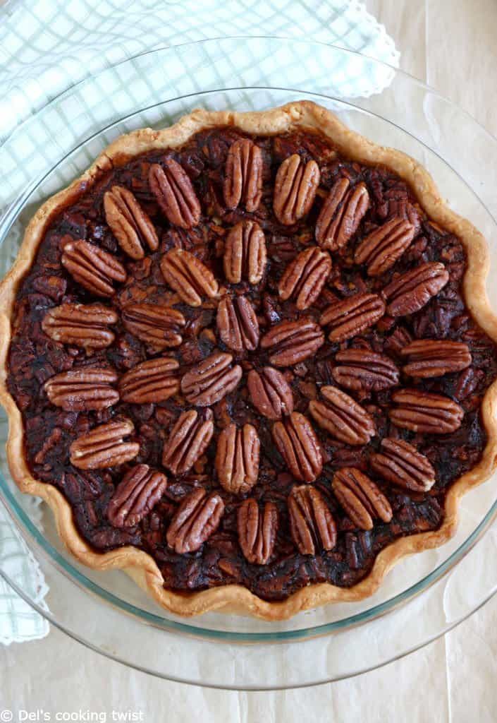 Here's the BEST pecan pie recipe. This old-fashioned dessert features a sweet, gooey center, and crunchy pecans. Perfect for the holidays!