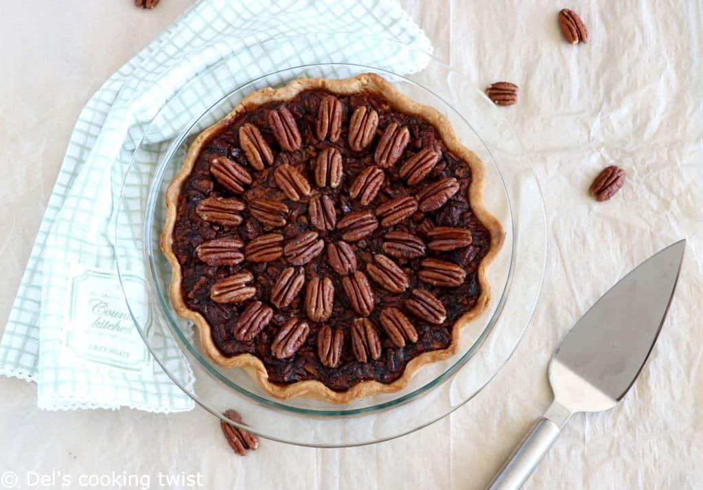 Here's the BEST pecan pie recipe. This old-fashioned dessert features a sweet, gooey center, and crunchy pecans. Perfect for the holidays!