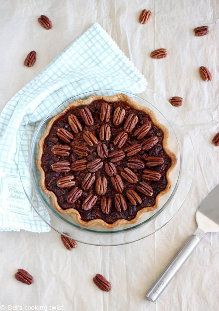 Here's the BEST pecan pie recipe. This old-fashioned dessert features a sweet, gooey center, and crunchy pecans. Perfect for the holidays!