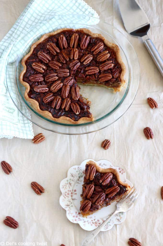 Here's the BEST pecan pie recipe. This old-fashioned dessert features a sweet, gooey center, and crunchy pecans. Perfect for the holidays!