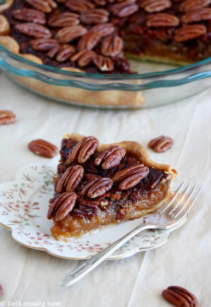 Here's the BEST pecan pie recipe. This old-fashioned dessert features a sweet, gooey center, and crunchy pecans. Perfect for the holidays!