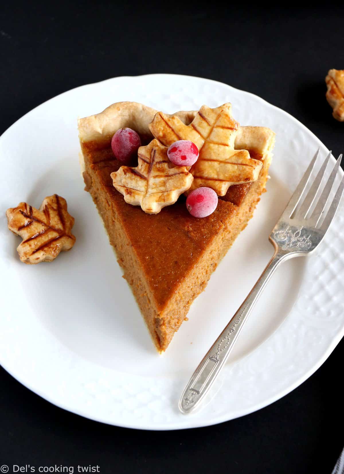 This classic pumpkin pie recipe features a flaky pie crust and a smooth pumpkin filling bursting with pumpkin spice flavors. Using wholesome ingredients only, it's the ultimate Thanksgiving dessert!