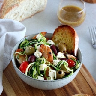 This delicious Greek chicken salad with zoodles (zucchini noodles), feta and olives makes a wonderful summer meal.