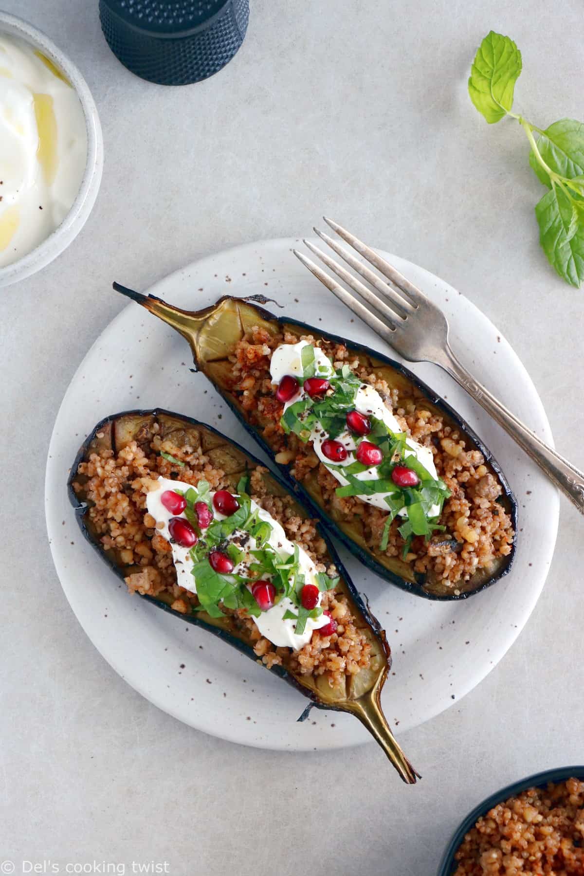Quinoa Stuffed Eggplant with Mint Yogurt Sauce