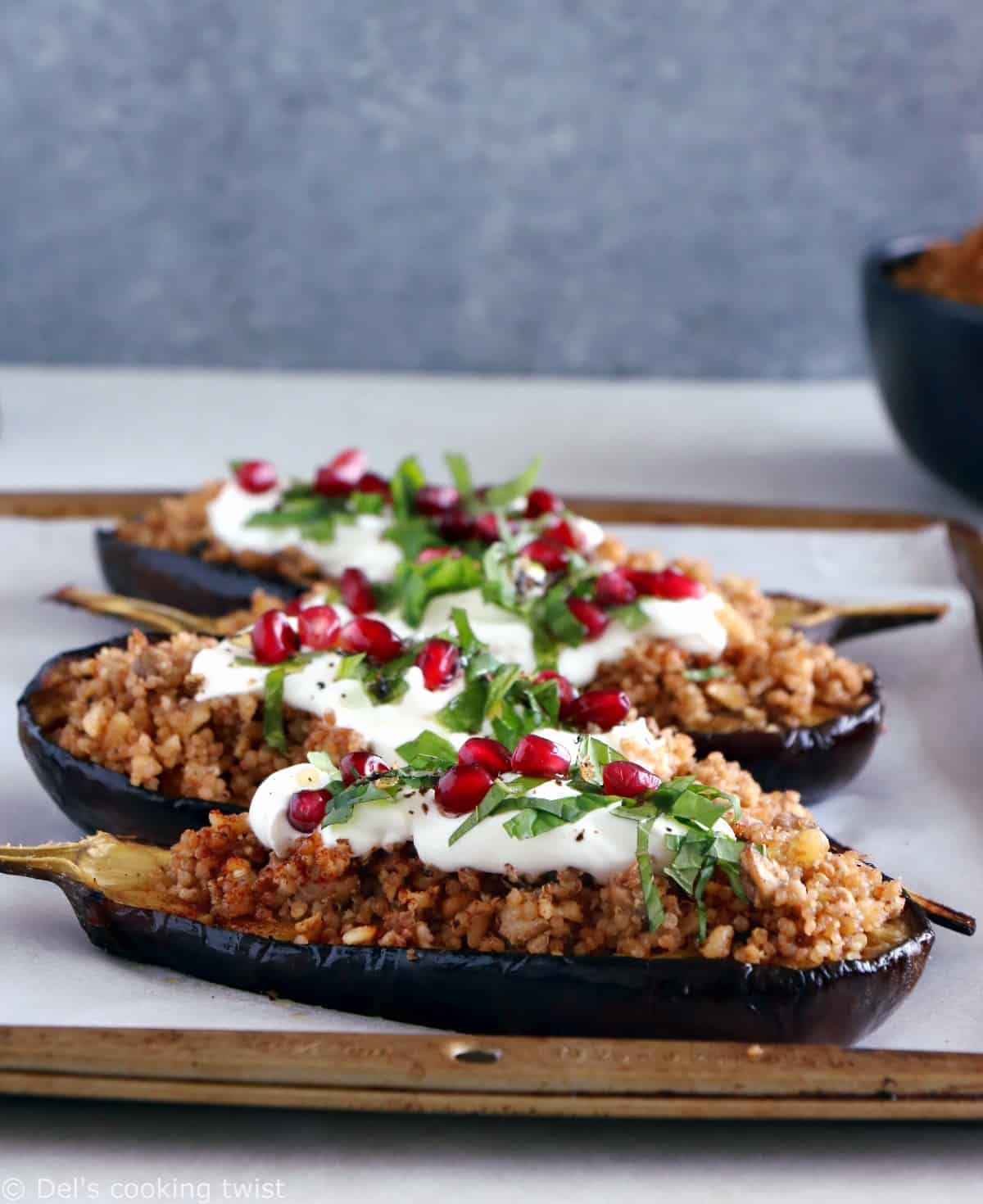 Quinoa Stuffed Eggplant with Mint Yogurt Sauce