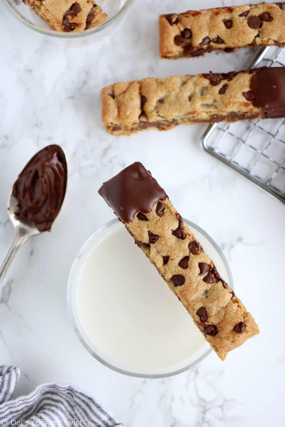Chocolate-Dipped Cookie Sticks. Chocolate-dipped cookie sticks are a fun twist to your classic cookies and just perfect for dunking into a cold glass of milk. Made in a pan for easy baking, they are chewy, slightly crispy, with an irresistible chocolate coating!