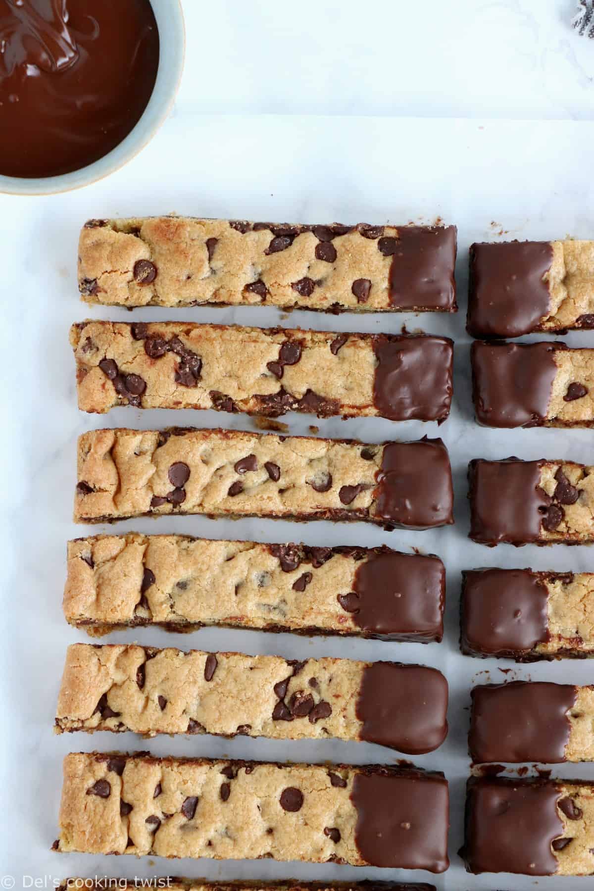 Chocolate-Dipped Cookie Sticks. Chocolate-dipped cookie sticks are a fun twist to your classic cookies and just perfect for dunking into a cold glass of milk. Made in a pan for easy baking, they are chewy, slightly crispy, with an irresistible chocolate coating!