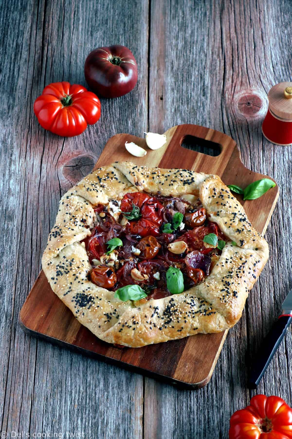 Balsamic Caramelized Onions and Goat Cheese Tomato Galette. This tomato galette is prepared with balsamic caramelized onions, heirloom tomatoes and fresh goat cheese, all tucked into a flaky pie crust. It makes a great end of summer light dinner, appetizer or brunch item.