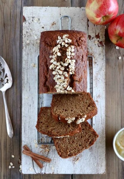 Healthy whole wheat apple bread is a low fat recipe prepared with whole wheat flour, shredded apples and is lightly sweetened with applesauce. This simple apple bread recipe is a winner.