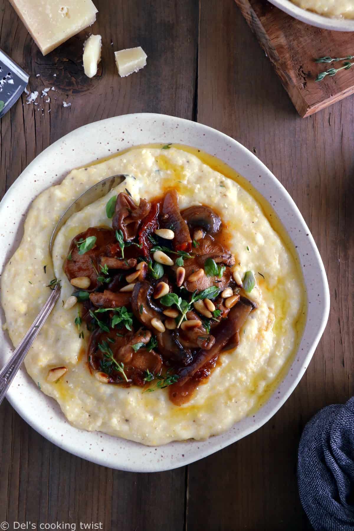 Parmesan polenta with thyme mushroom ragu makes a hearty plant-based dinner recipe for those chilly days. Enjoy with a glass of wine!