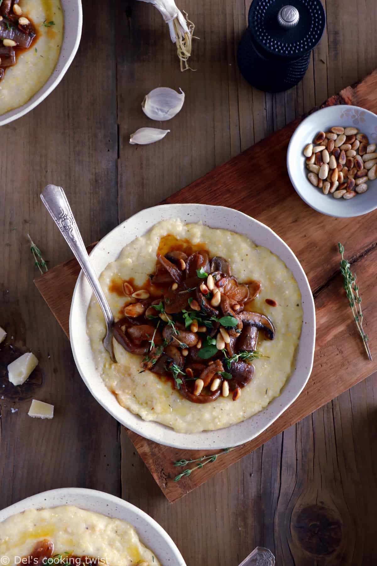 Parmesan polenta with thyme mushroom ragu makes a hearty plant-based dinner recipe for those chilly days. Enjoy with a glass of wine!