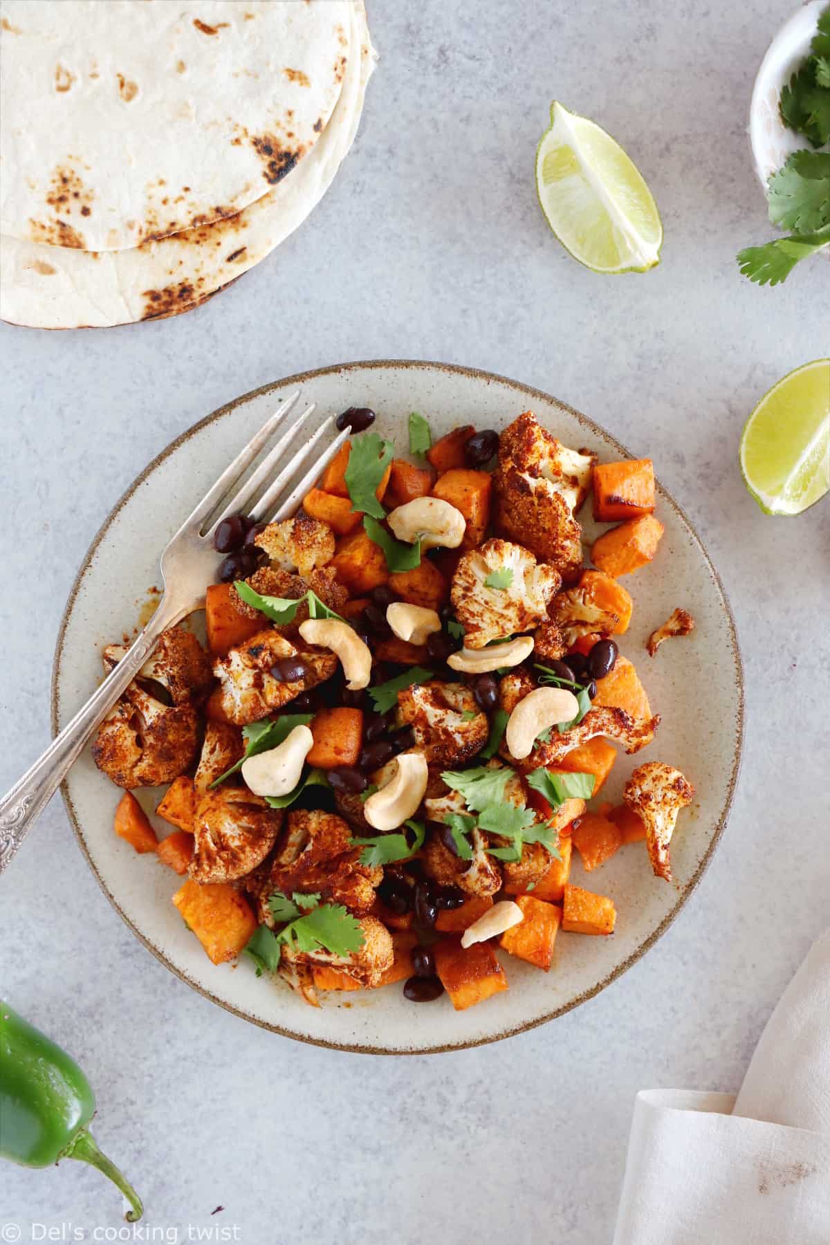 Spicy Vegan Sweet Potato and Cauliflower Tacos. Healthy vegan tacos filled with roasted sweet potato and cauliflower, mashed avocado and topped with a spicy cashew sauce. They are loaded with healthy and hearty flavors and make a perfect, quick, and easy weeknight dinner. These tacos are Oh SO good!