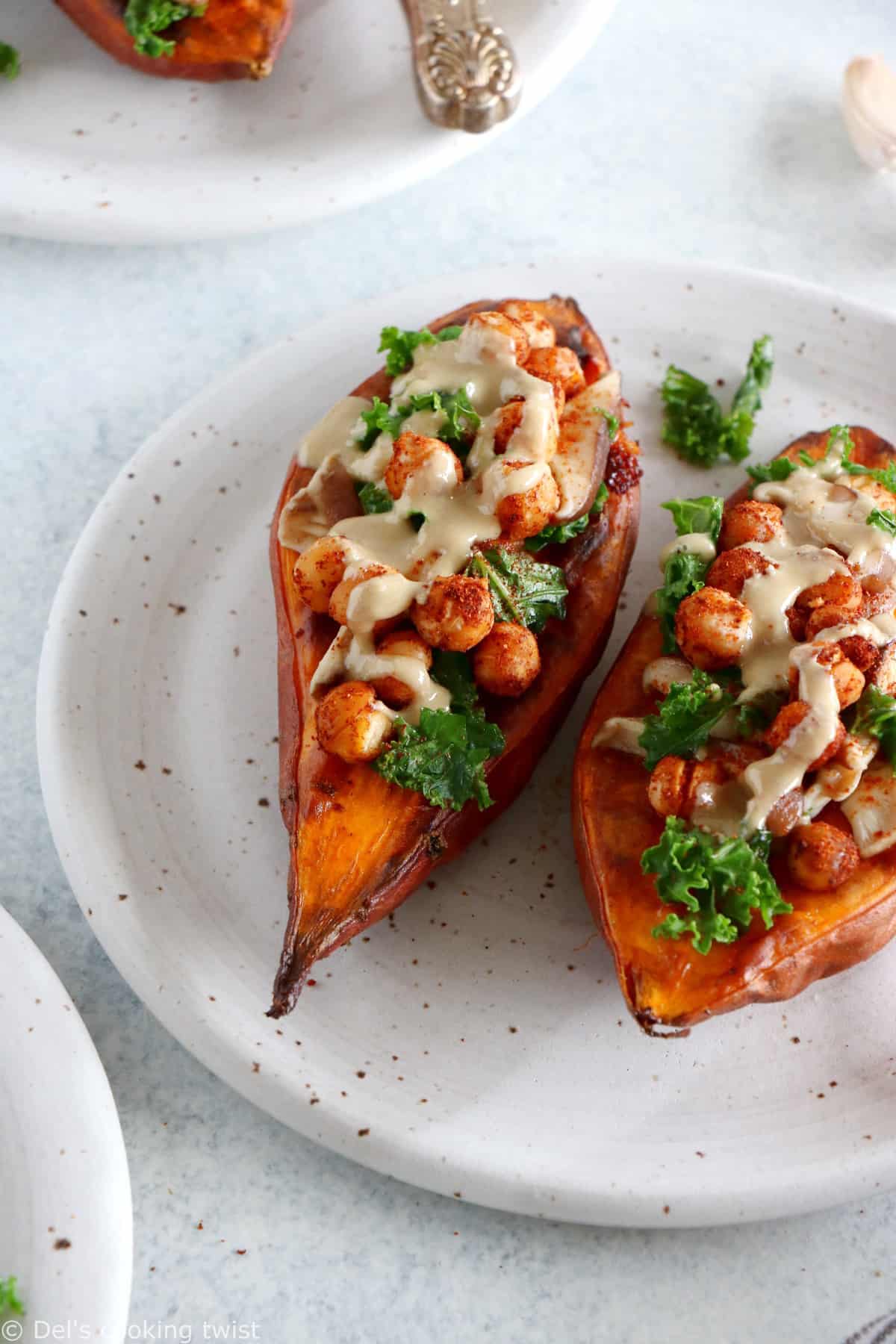 Fall harvest chickpea stuffed sweet potatoes are loaded with nutritious plant-based ingredients and make a delicious healthy, wholesome weeknight dinner.