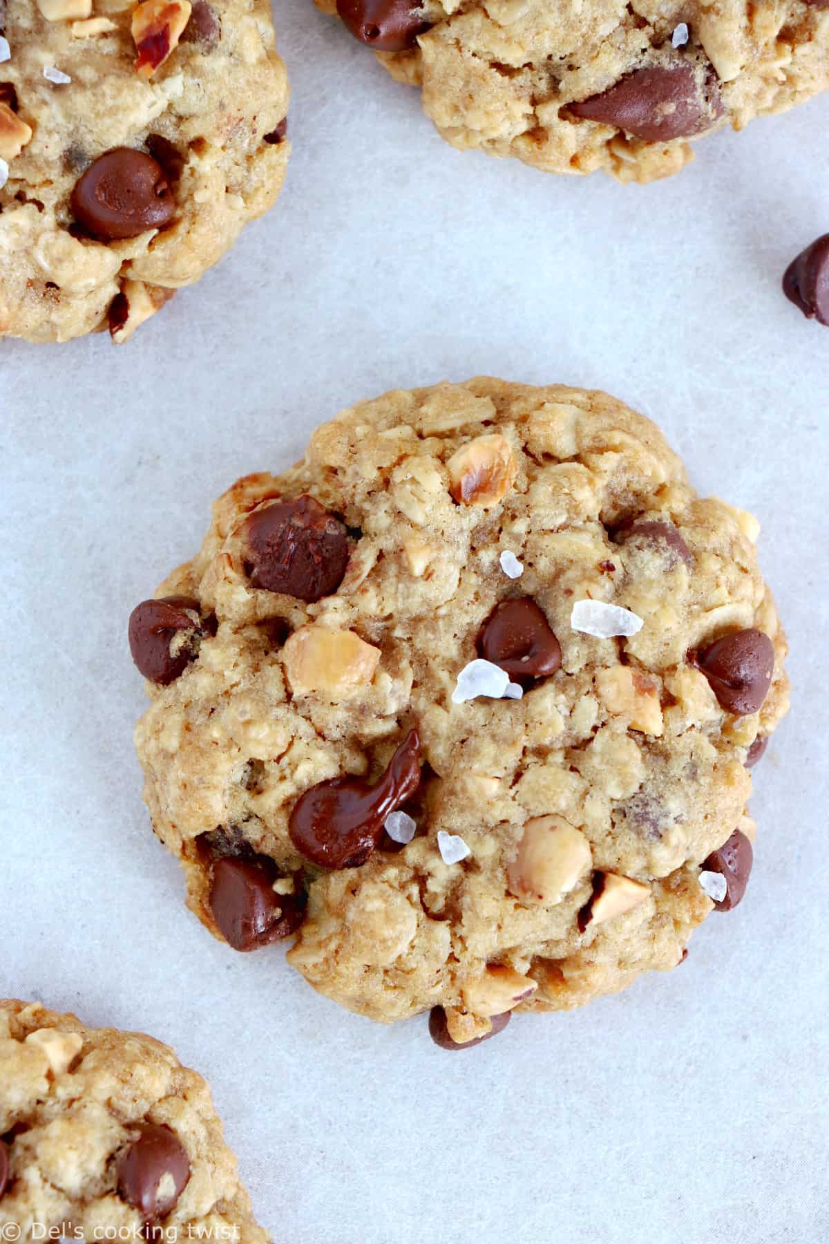 Simple chocolate chip oatmeal cookies with hazelnuts are perfect bakery-style cookies. They are easy to make, with old fashioned oats, chocolate chips and chopped hazelnuts.
