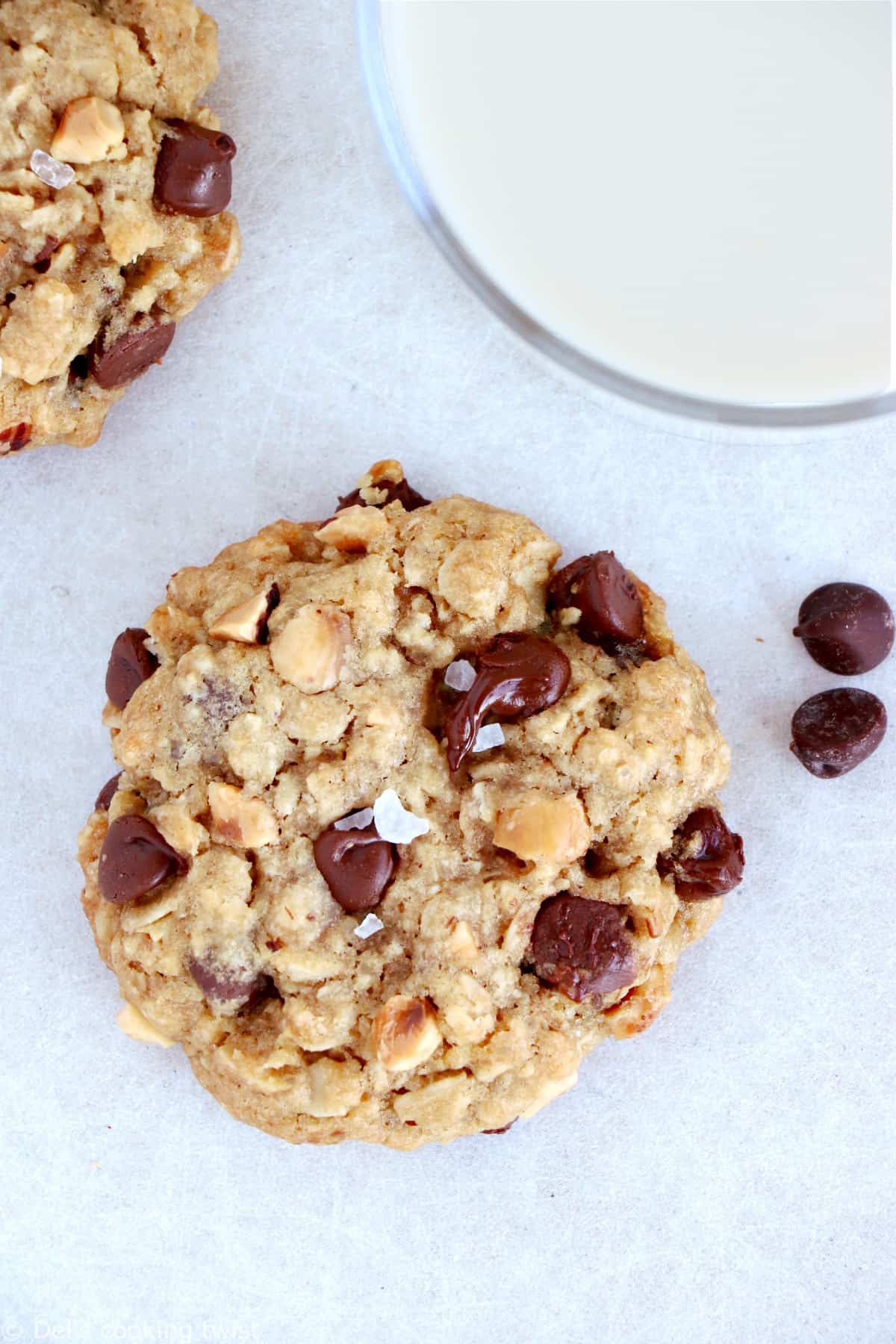 Simple chocolate chip oatmeal cookies with hazelnuts are perfect bakery-style cookies. They are easy to make, with old fashioned oats, chocolate chips and chopped hazelnuts.