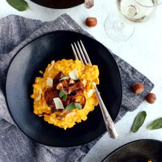 Butternut squash risotto is easy to prepare and packed with warm, hearty and cozy fall flavors. Serve it as is with sage for an everyday meal or top it with sautéed chanterelles mushrooms, toasted hazelnuts, and you get a fancy dish for Thanksgiving or any special occasion.