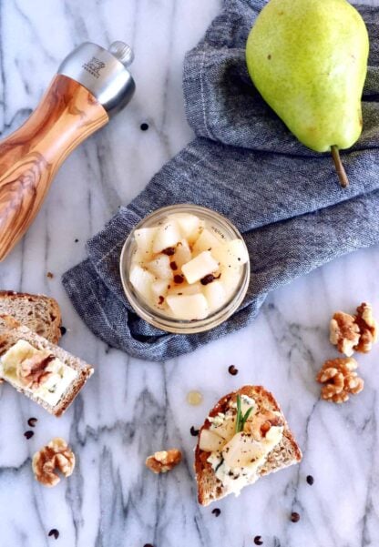 This easy pear compote with black peppercorn and vanilla syrup will be perfect as an appetizer on your cheese board for your next gathering party!
