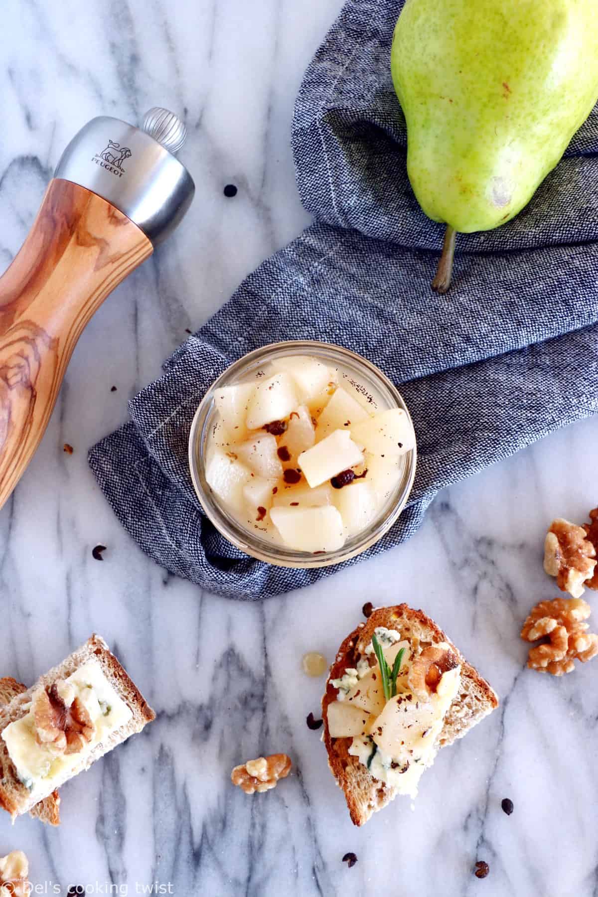 This easy pear compote with black peppercorn and vanilla syrup will be perfect as an appetizer on your cheese board for your next gathering party!