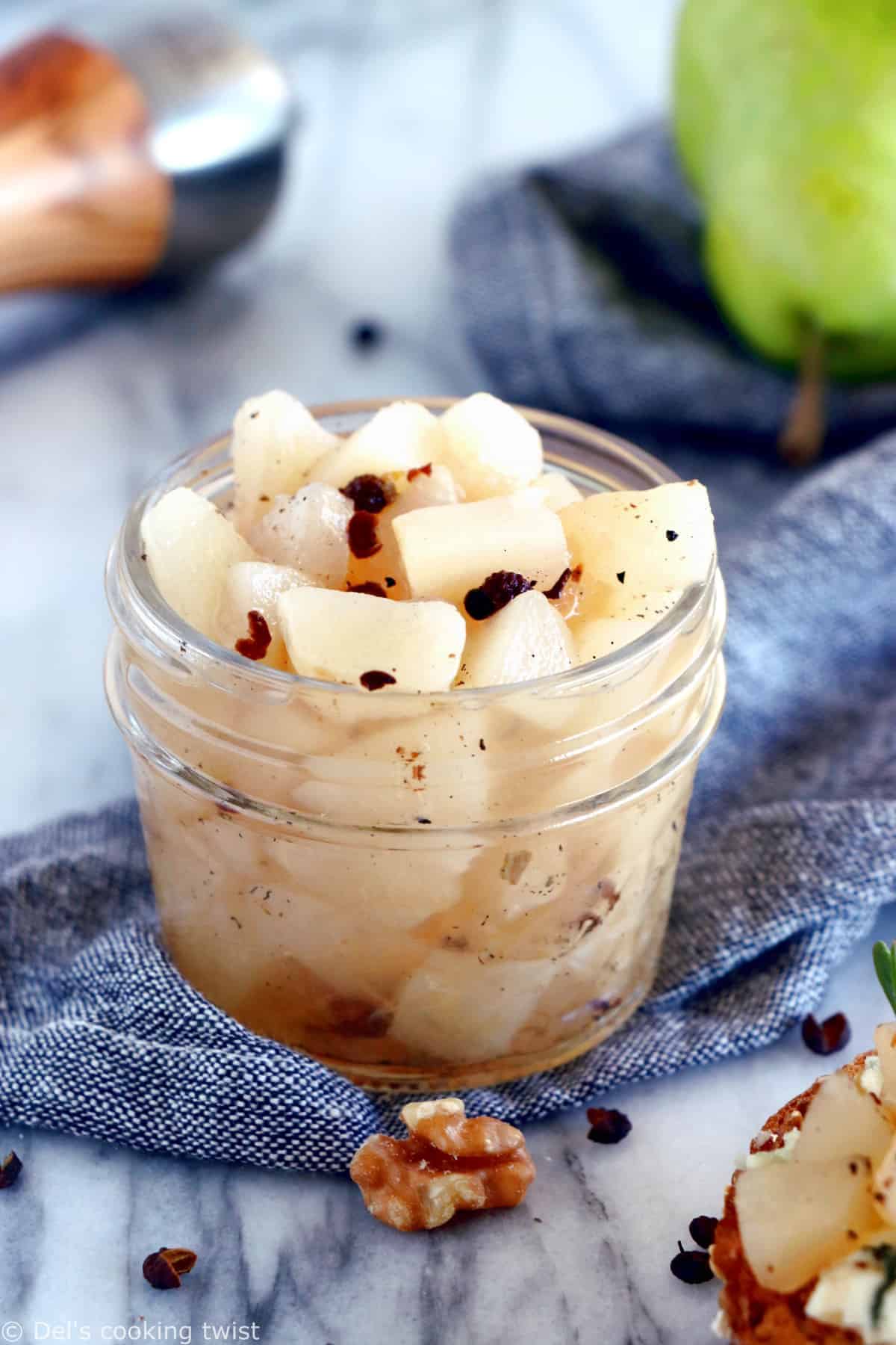This easy pear compote with black peppercorn and vanilla syrup will be perfect as an appetizer on your cheese board for your next gathering party!