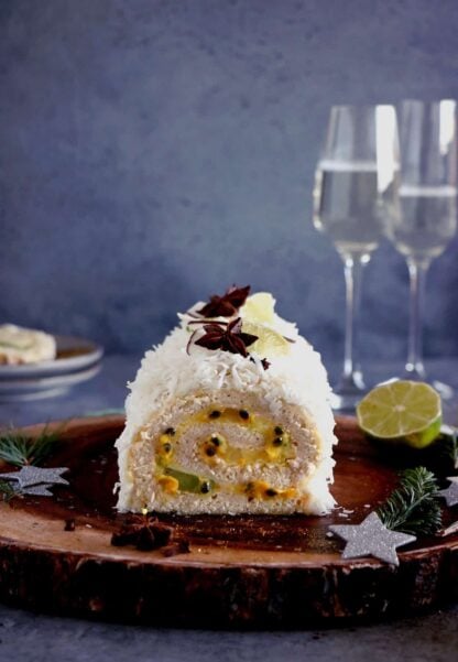 This toasted coconut tropical fruit cake roll is subtle, fruity, and just irresistible. Within a light and fluffy sponge cake, you'll find a delicious mango-lime curd with various tropical fruits.