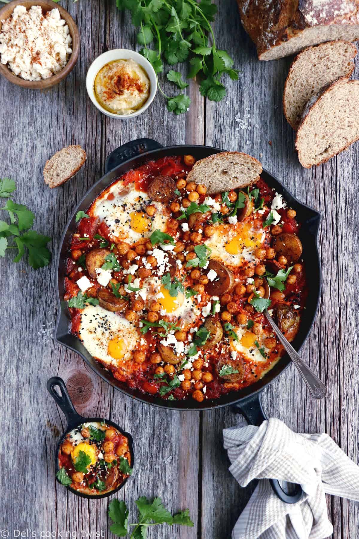 Take the shakshuka to the next level with this deluxe shakshuka recipe, featuring the classic baked eggs and tomatoes with an extra kick of spicy roasted potatoes and chickpeas.