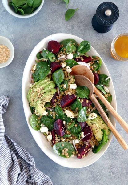 French lentil salad with beets, baby spinach and feta cheese is a nourishing healthy winter salad recipe, naturally gluten-free and easy to make.