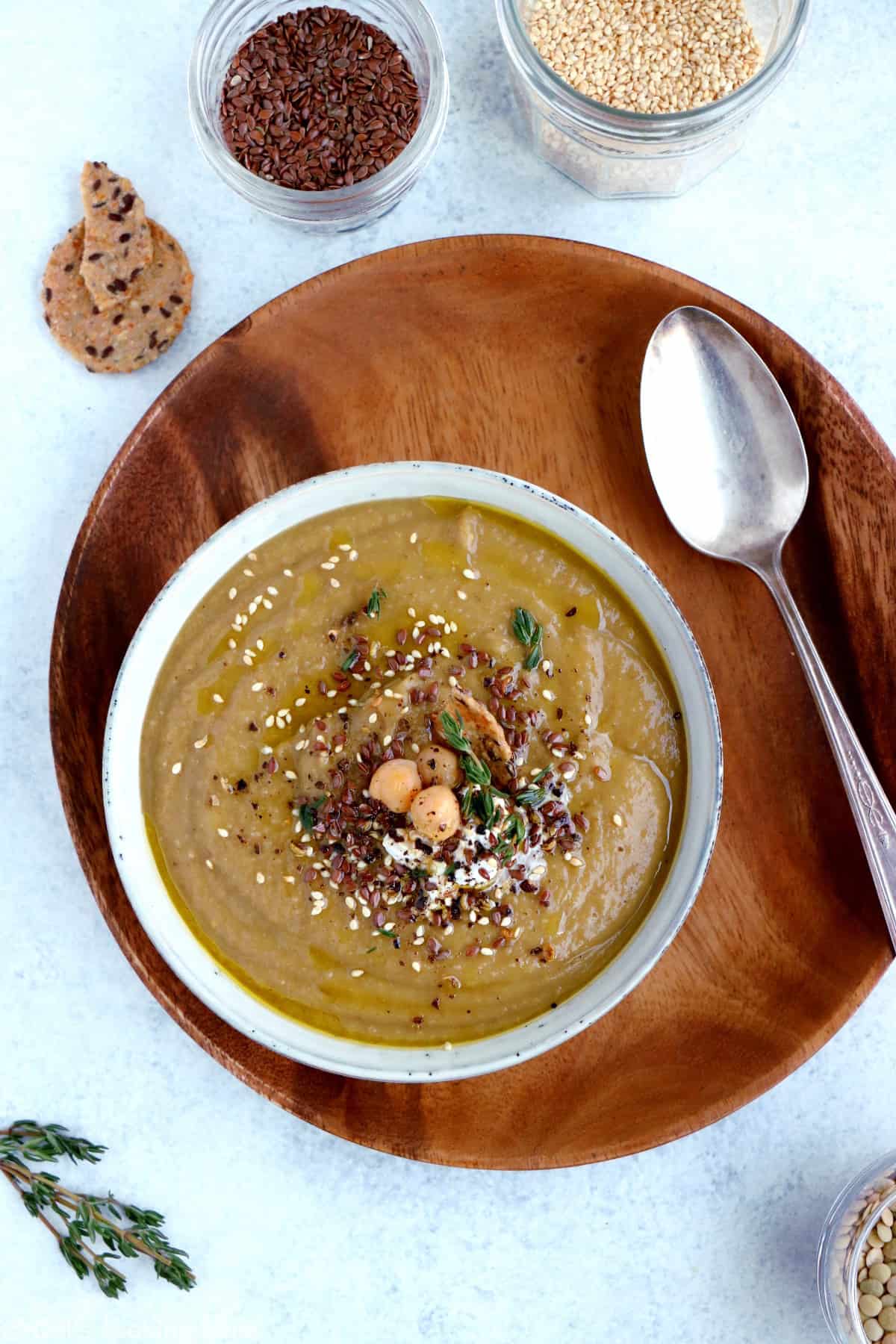 Grandma's nourishing lentil soup with roasted vegetables and all-spice is hearty, healthy, and packed with plant-based protein.