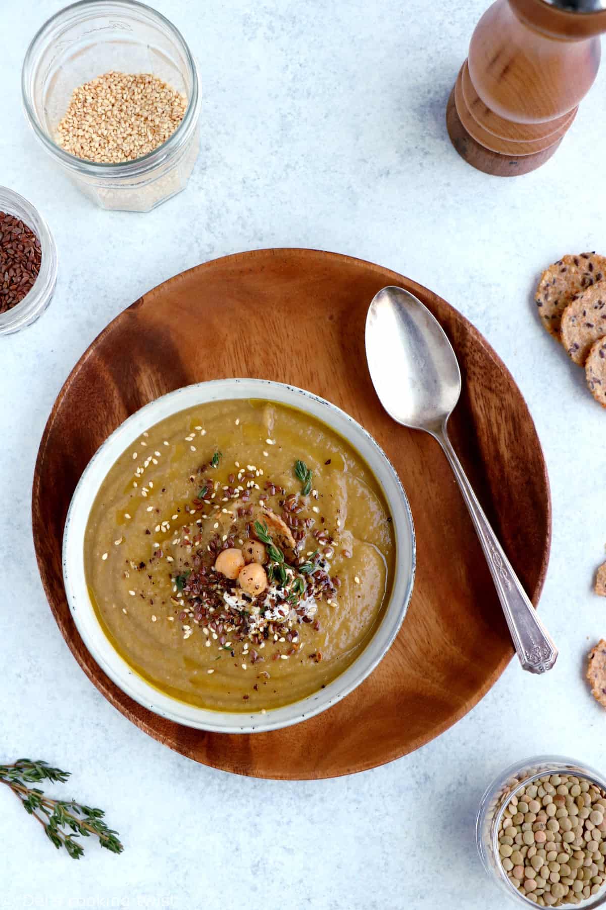 Grandma's nourishing lentil soup with roasted vegetables and all-spice is hearty, healthy, and packed with plant-based protein.