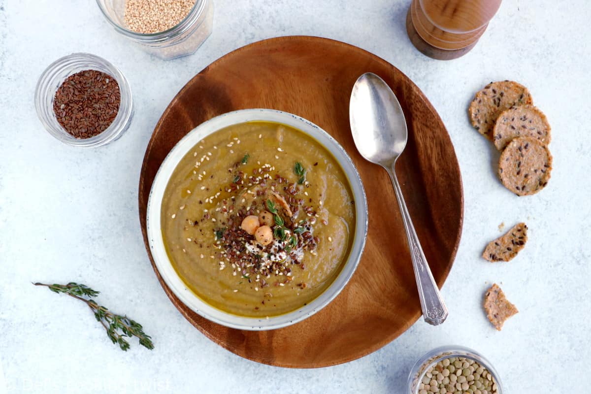 Grandma's nourishing lentil soup with roasted vegetables and all-spice is hearty, healthy, and packed with plant-based protein.