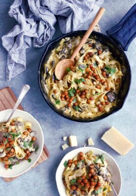 This quick everyday pasta dish features a deliciously creamy mushroom sauce and some crispy spiced chickpeas. An easy family-friendly vegetarian meal everyone loves!