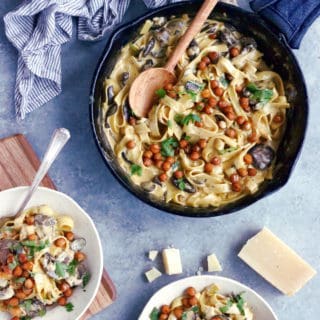This quick everyday pasta dish features a deliciously creamy mushroom sauce and some crispy spiced chickpeas. An easy family-friendly vegetarian meal everyone loves!