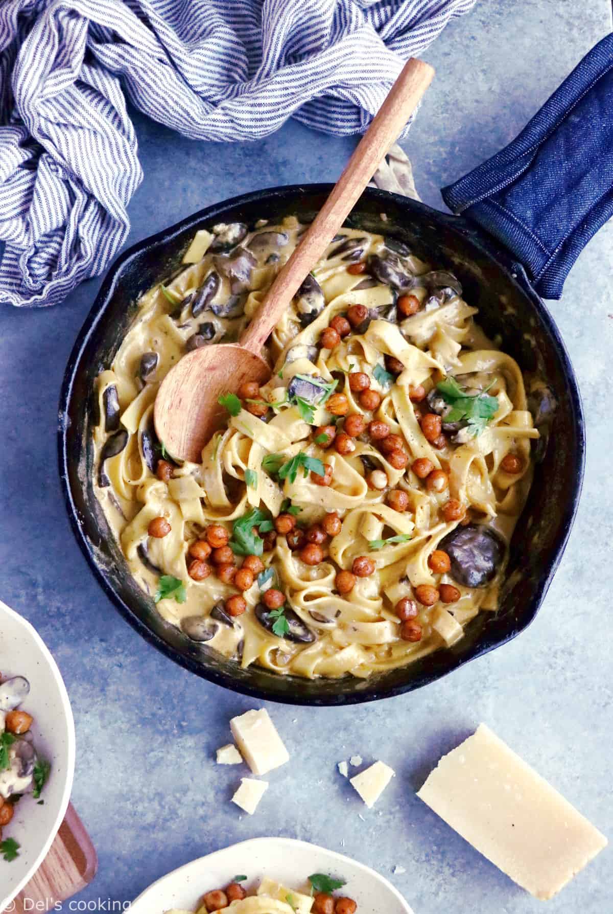 This quick everyday pasta dish features a deliciously creamy mushroom sauce and some crispy spiced chickpeas. An easy family-friendly vegetarian meal everyone loves!