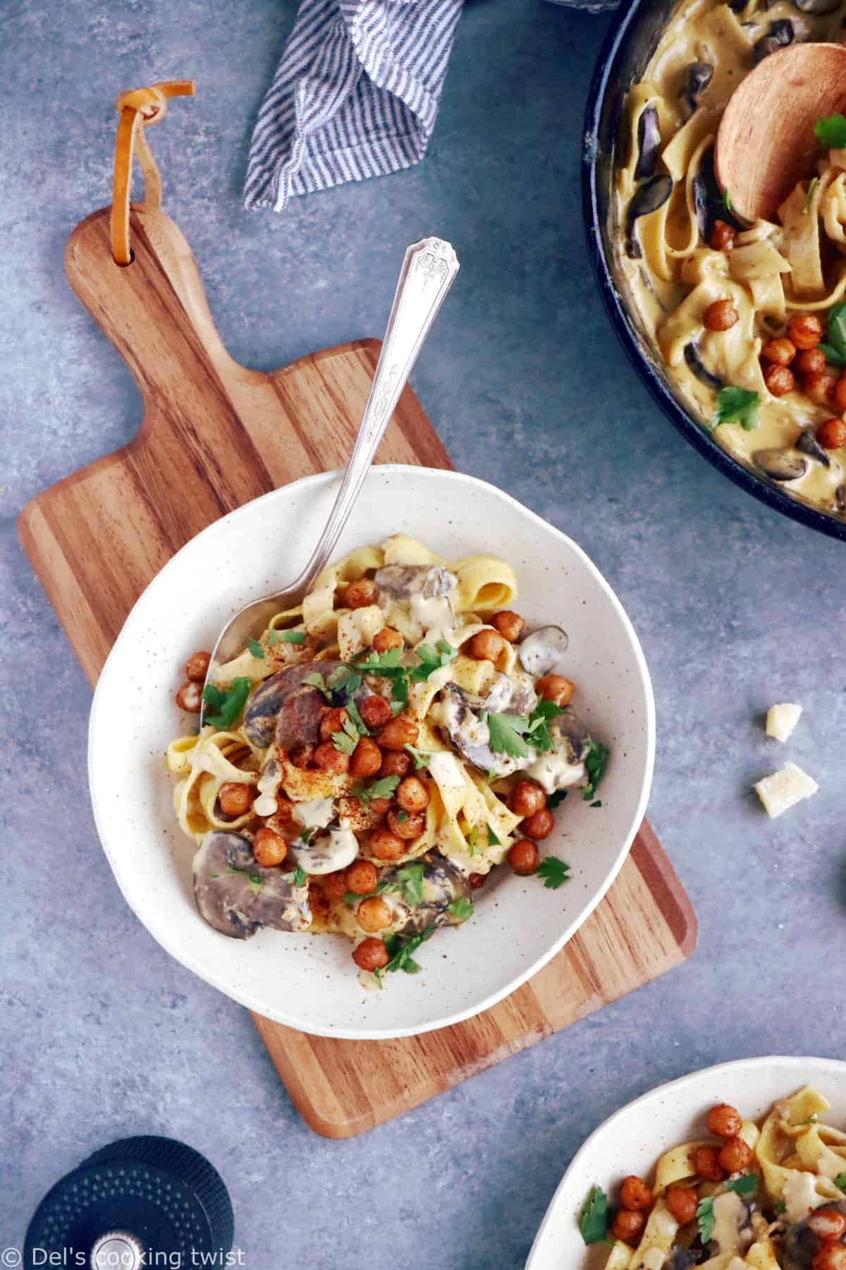 This quick everyday pasta dish features a deliciously creamy mushroom sauce and some crispy spiced chickpeas. An easy family-friendly vegetarian meal everyone loves!