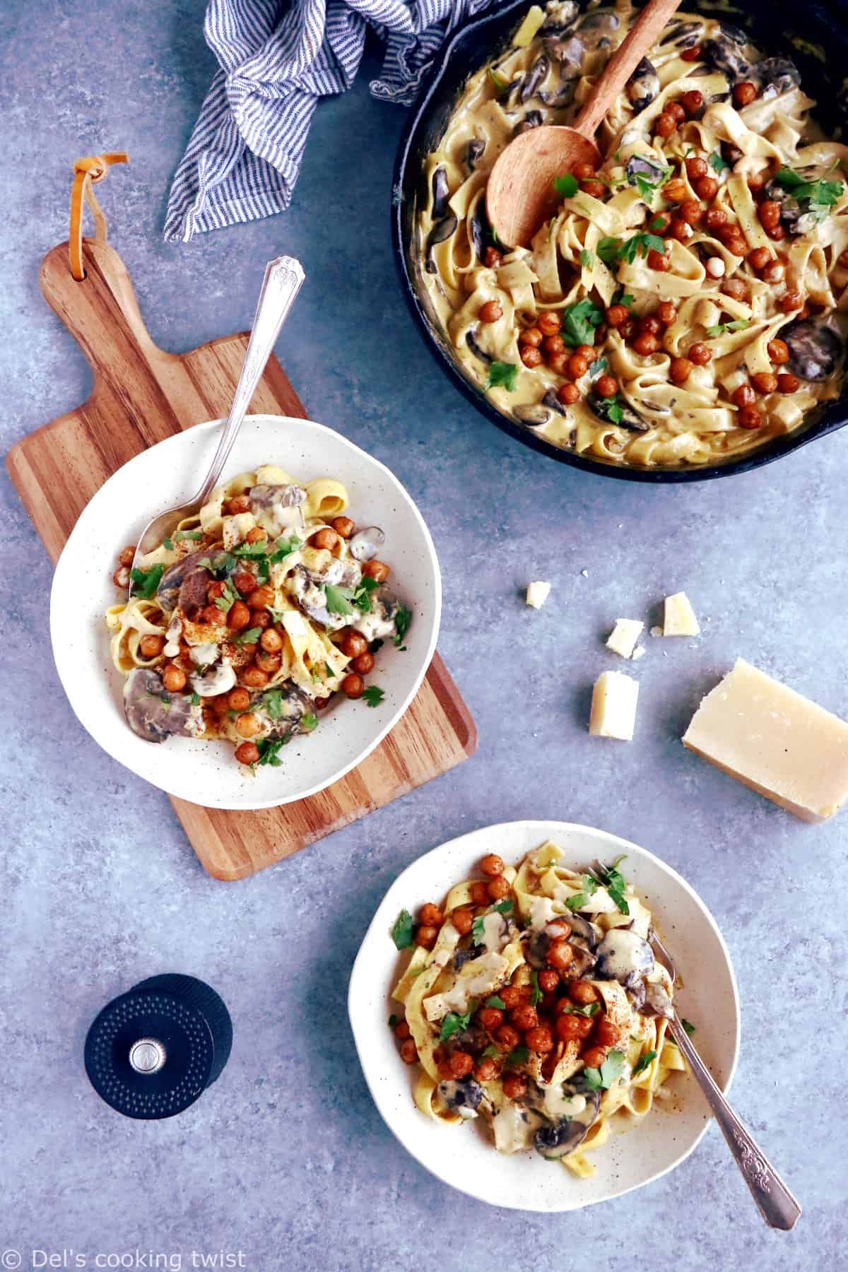 This quick everyday pasta dish features a deliciously creamy mushroom sauce and some crispy spiced chickpeas. An easy family-friendly vegetarian meal everyone loves!