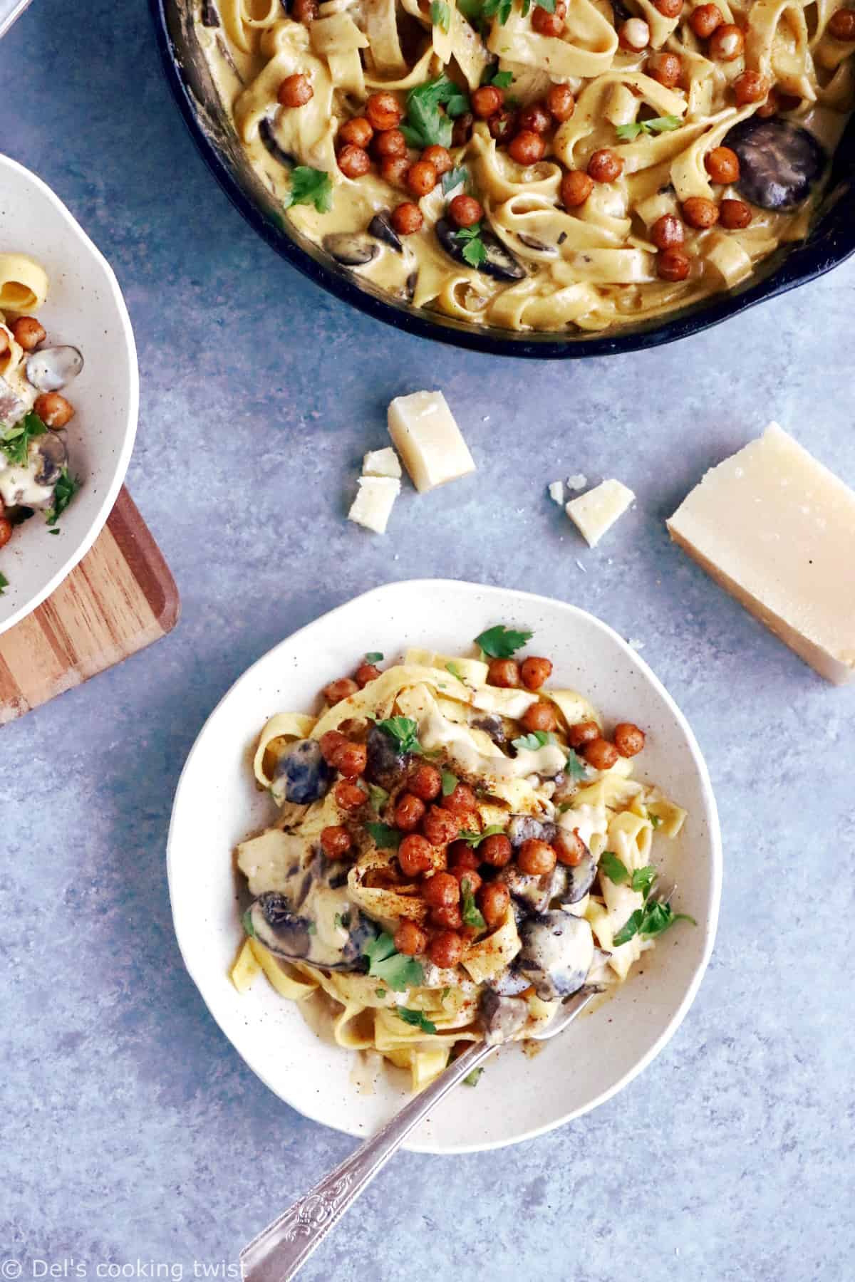 This quick everyday pasta dish features a deliciously creamy mushroom sauce and some crispy spiced chickpeas. An easy family-friendly vegetarian meal everyone loves!