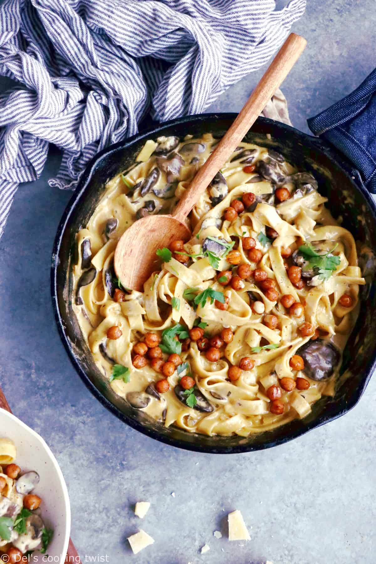 This quick everyday pasta dish features a deliciously creamy mushroom sauce and some crispy spiced chickpeas. An easy family-friendly vegetarian meal everyone loves!