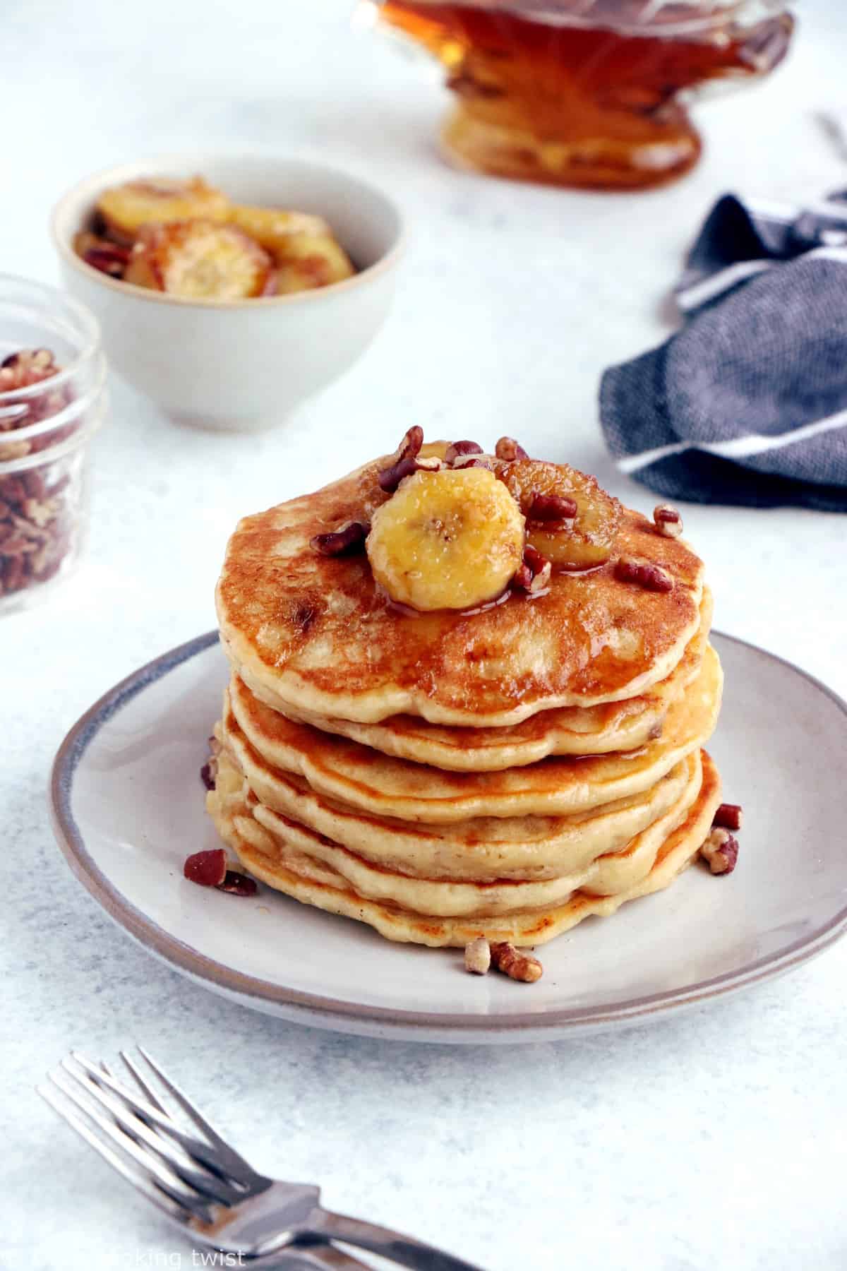 This easy fluffy banana pancake recipe yields generous, light, and airy pancakes, loaded with banana bread flavor.