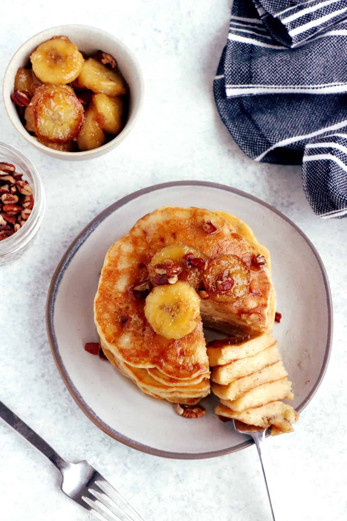 This easy fluffy banana pancake recipe yields generous, light, and airy pancakes, loaded with banana bread flavor.