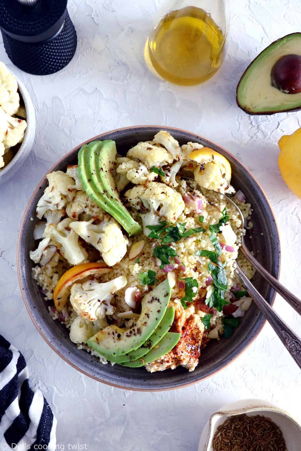 This quick and easy cumin-roasted cauliflower tabbouleh salad is game-changing. It's a super healthy vegan salad recipe, packed with delicious roasted veggies, fresh herbs, and loaded with plant-based protein.