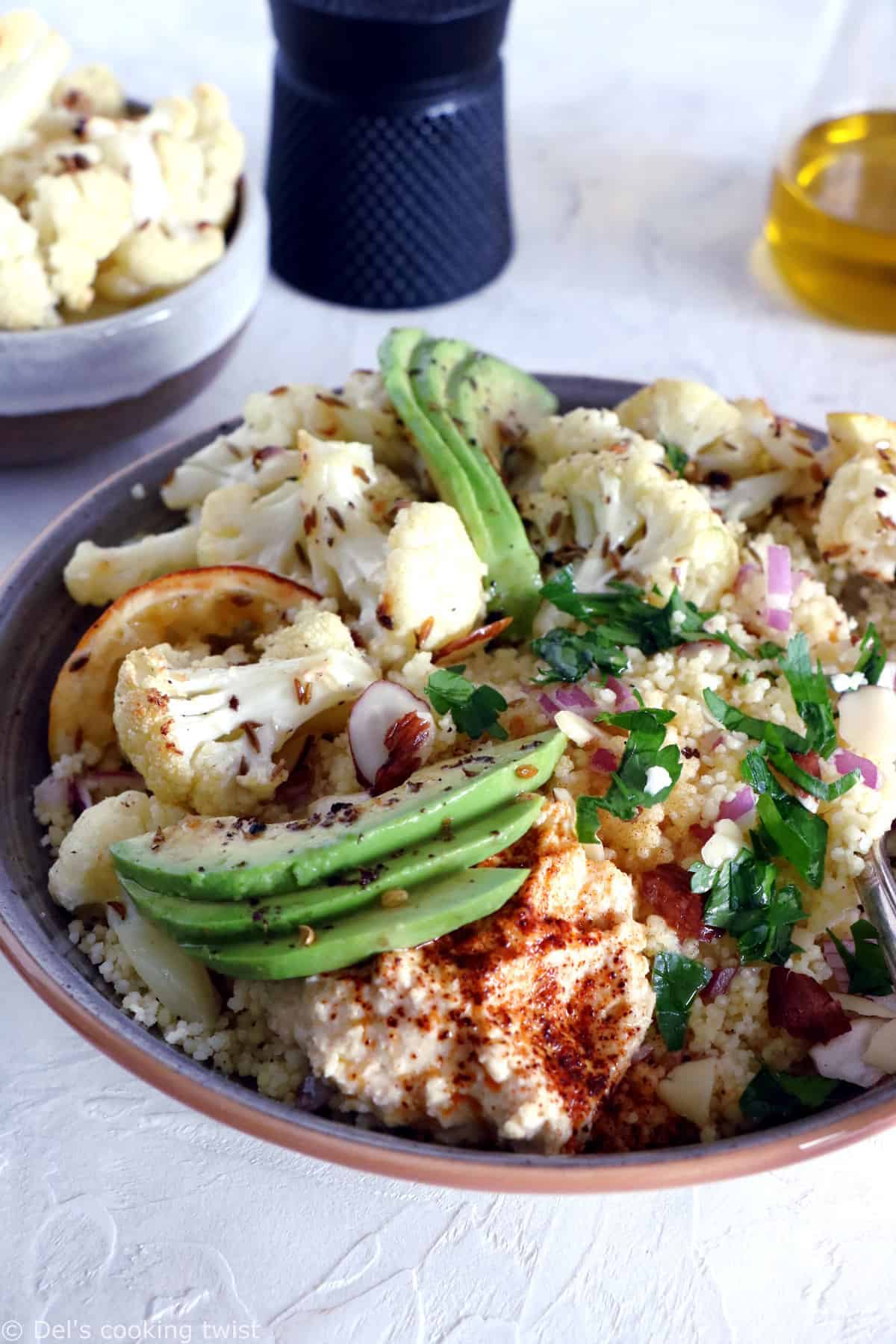 This quick and easy cumin-roasted cauliflower tabbouleh salad is game-changing. It's a super healthy vegan salad recipe, packed with delicious roasted veggies, fresh herbs, and loaded with plant-based protein.