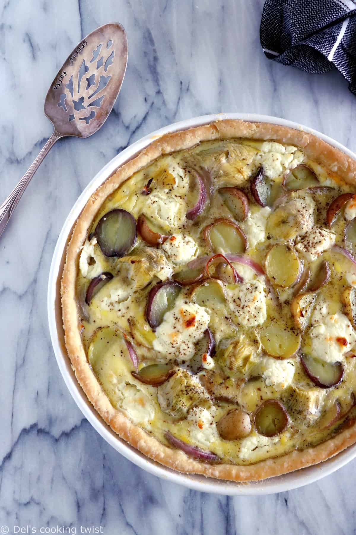 This potato, goat cheese and artichoke quiche is pretty much straight-forward. It features simple but delicious garden vegetables combined with creamy, cheesy flavors, on top of an easy olive pie crust.