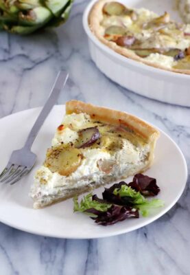 This potato, goat cheese and artichoke quiche is pretty much straight-forward. It features simple but delicious garden vegetables combined with creamy, cheesy flavors, on top of an easy olive pie crust.