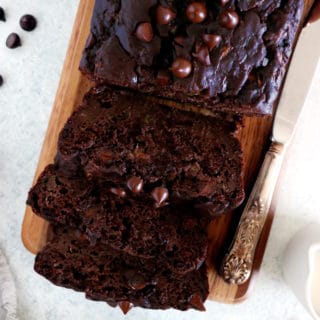 You will fall in love with this healthy chocolate zucchini bread recipe. Super easy to make, it is naturally sweetened with applesauce and it has a rich and irresistible moist texture.