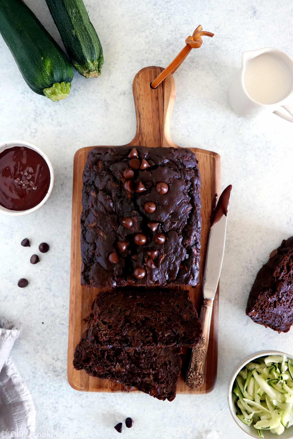 You will fall in love with this healthy chocolate zucchini bread recipe. Super easy to make, it is naturally sweetened with applesauce and it has a rich and irresistible moist texture.