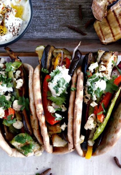 These Grilled Veggie Gyros with Feta-Yogurt Dip are a quick vegetarian version of the popular Greek sandwich made with pita bread.