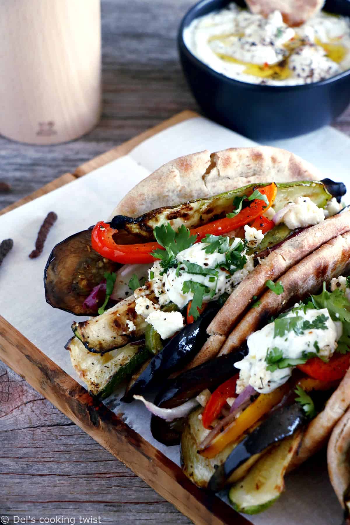 These Grilled Veggie Gyros with Feta-Yogurt Dip are a quick vegetarian version of the popular Greek sandwich made with pita bread.