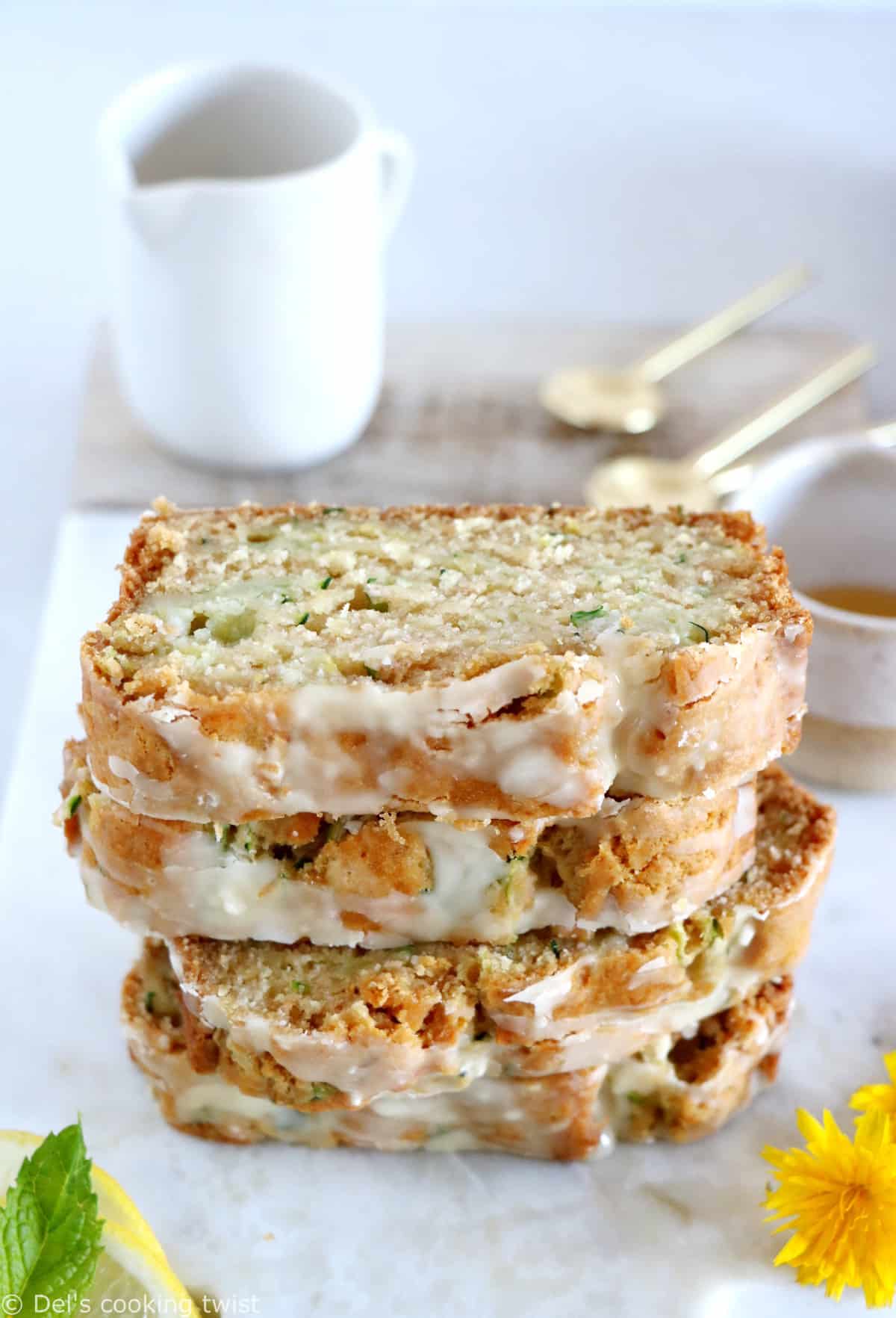 This healthy vegan lemon zucchini bread is light, fluffy and perfectly tender, with a subtle lemon glaze.